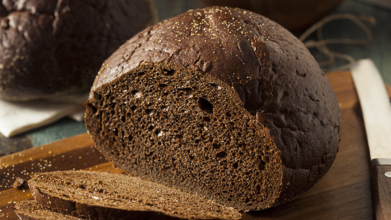 Pumpkernickel bread loaf sliced