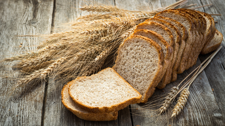 Whole wheat bread on wood