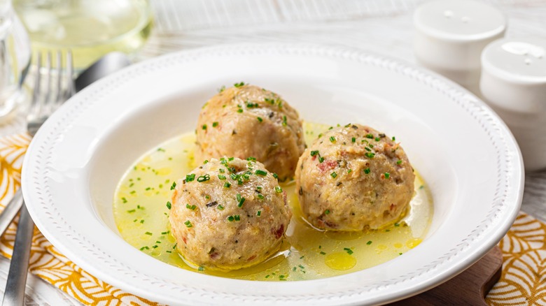 three bread dumplings in broth 