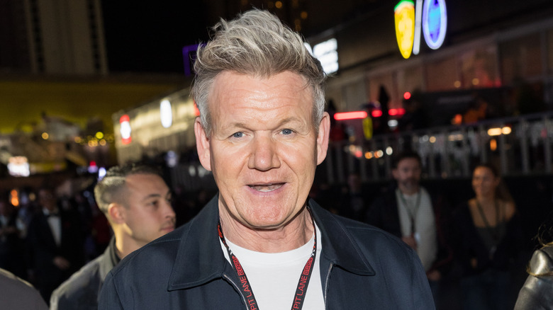 Gordon Ramsay outside amongst pedestrians