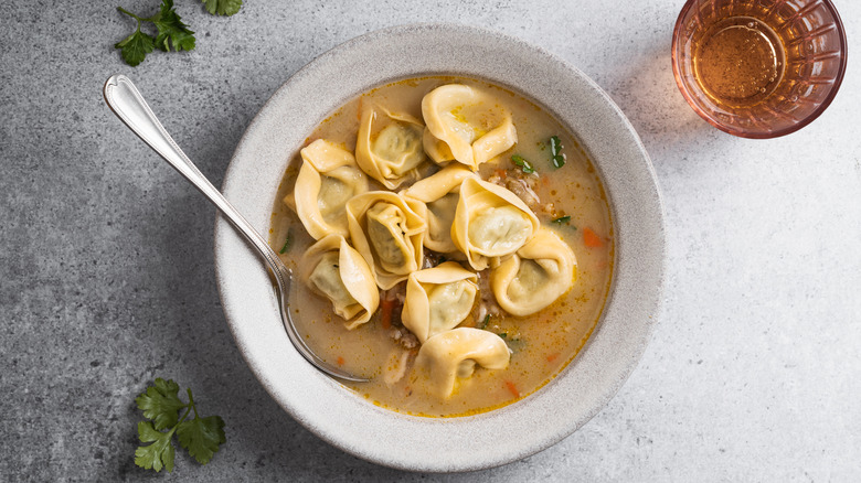 bowl of tortellini with vegetable broth