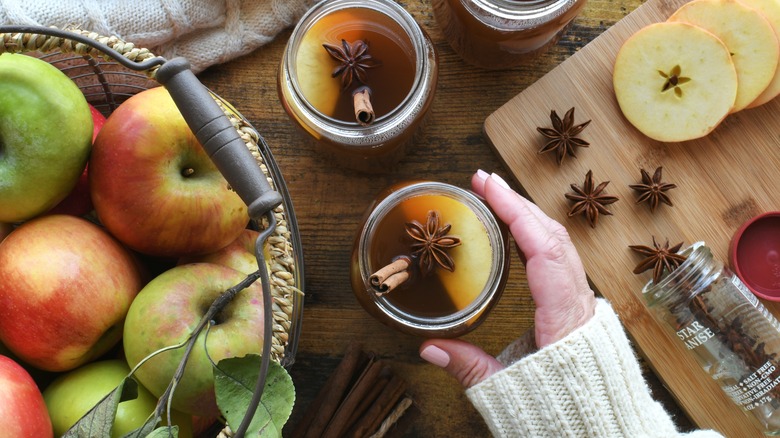 Home cook assembling a hot toddy