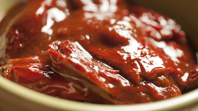 close up of chipotles in adobo