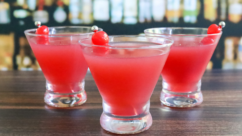 pink cocktails with maraschino cherries