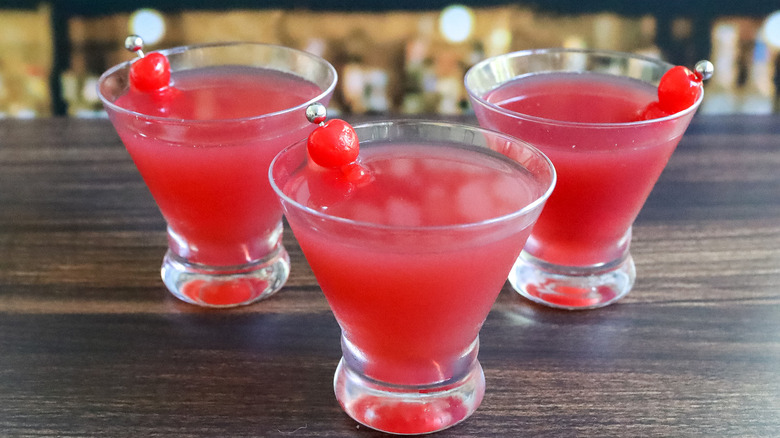 pink cocktails with maraschino cherries