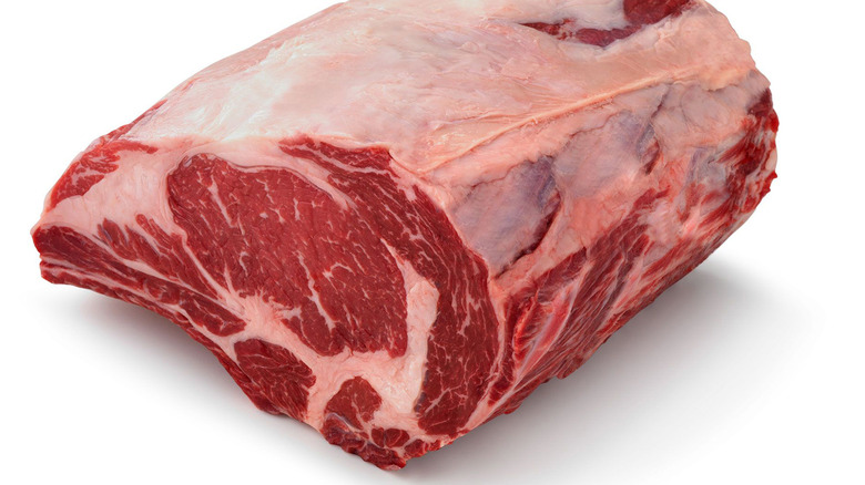 raw rib eye roast isolated