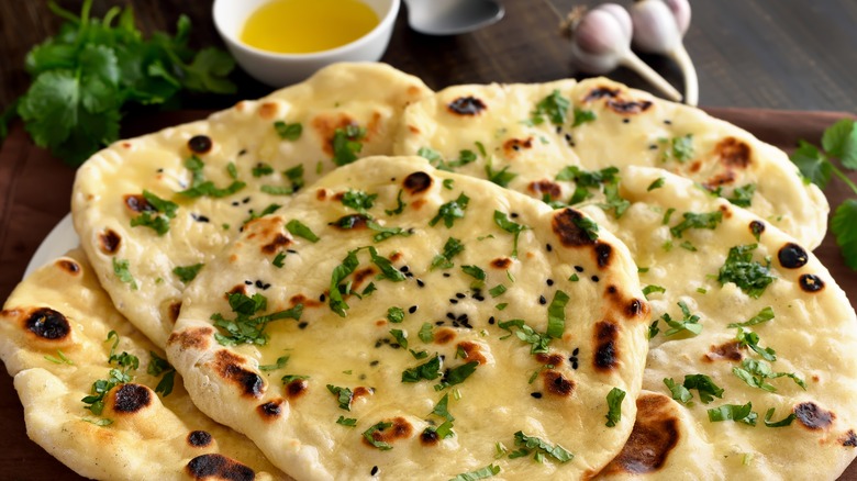 fresh naan bread with parsley on top