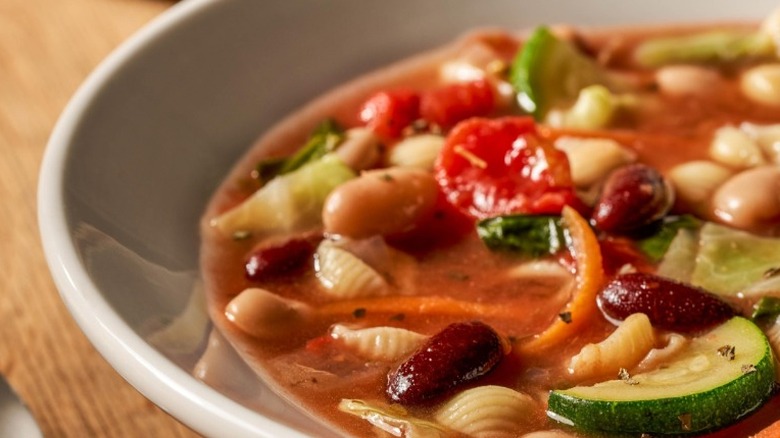 Olive Garden minestrone soup in a white bowl