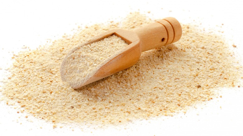 Wooden scooper with breadcrumbs