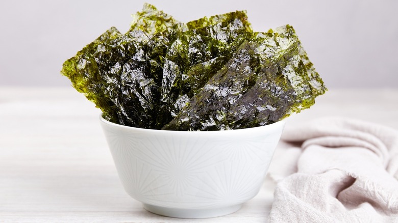 white bowl of dried seaweed