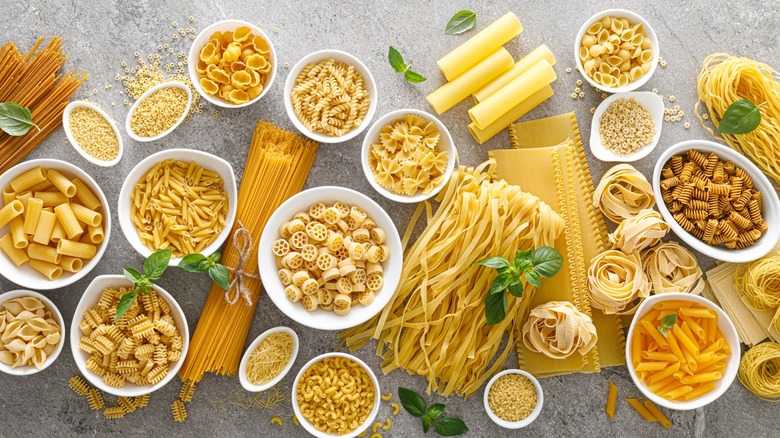 Various pasta types in bowls