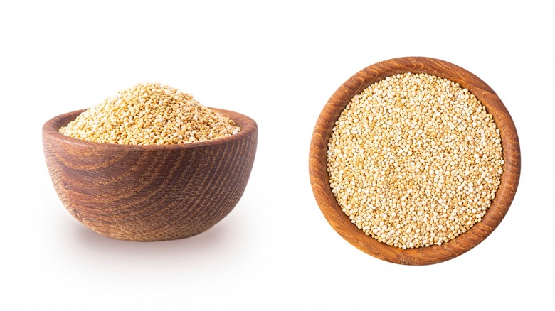 Wooden bowls of uncooked couscous