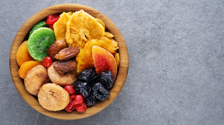Dried fruit in wooden bowl