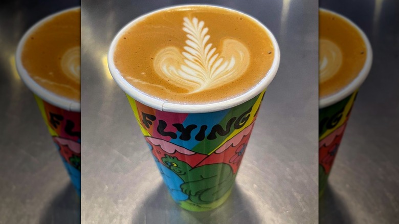 Coffee in a rainbow cup