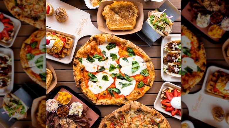 Table with pizzas, waffles, tacos