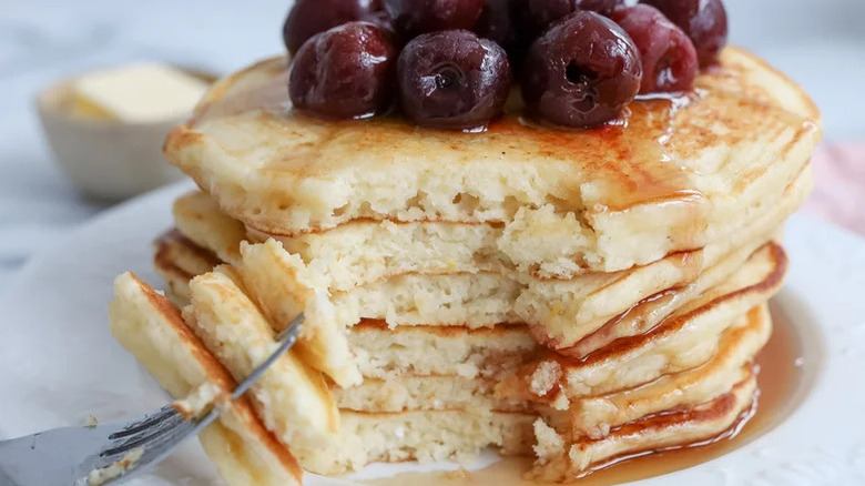 Ricotta pancakes with fruit on a plate