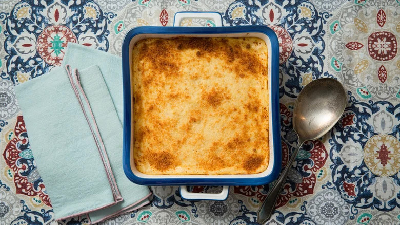 Casserole in a blue with with napkins