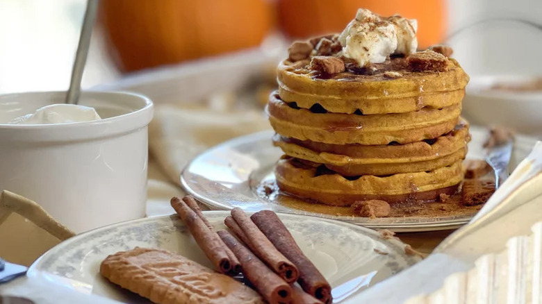 Cinnamon waffles with Lotus biscuit and whipped cream