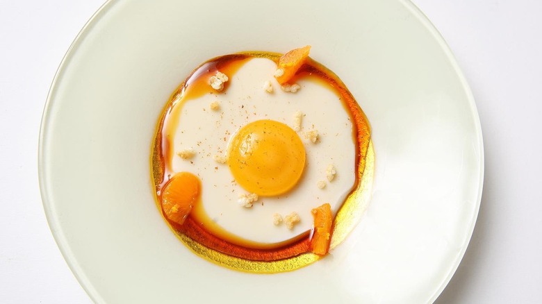 Crema Catalan egg in white bowl