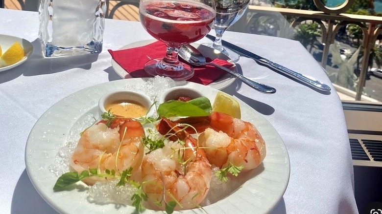 Shrimp brunch dish and cocktail