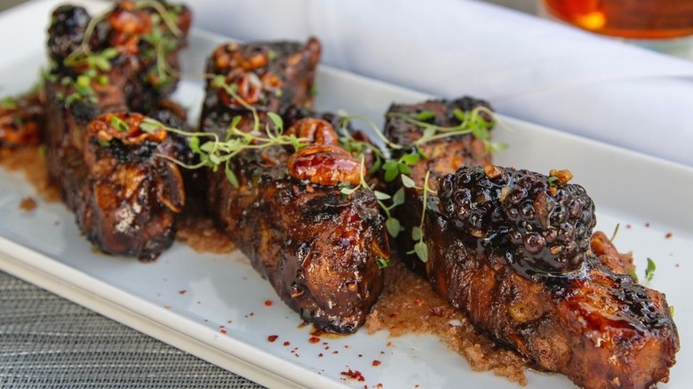 Ribs glazed with blackberry bulgogi jus