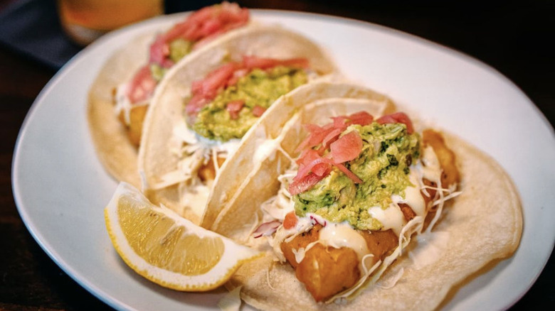 Fish taco platter with toppings