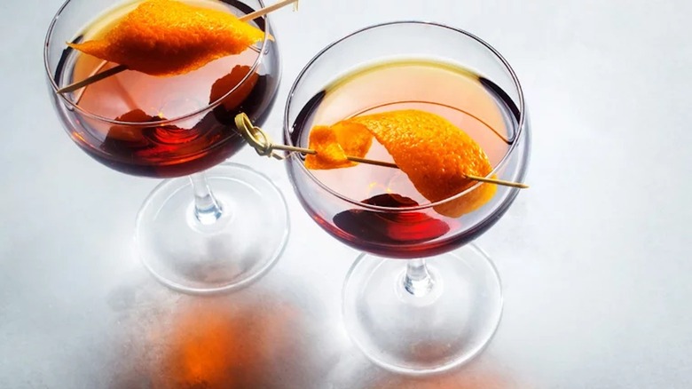 Adonis cocktail with orange garnish