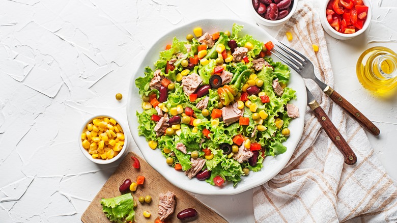 Canned corn in green salad