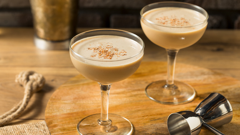 Brandy Alexander cocktails on a wooden table