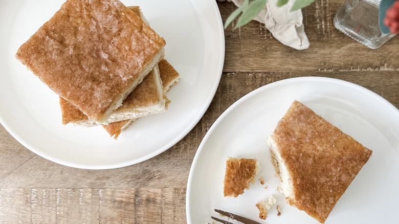 sopapilla cheesecake squares on plates