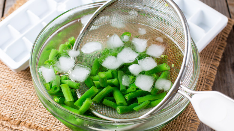 Green beans in ice water