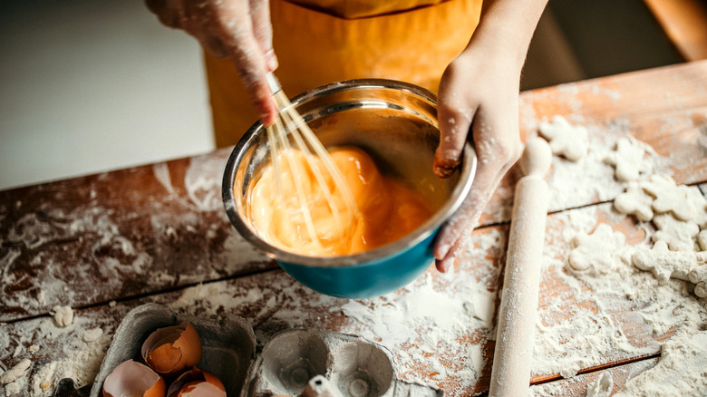 Whisking ingredients in bowl