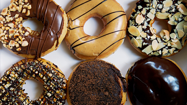 Six donuts on white background