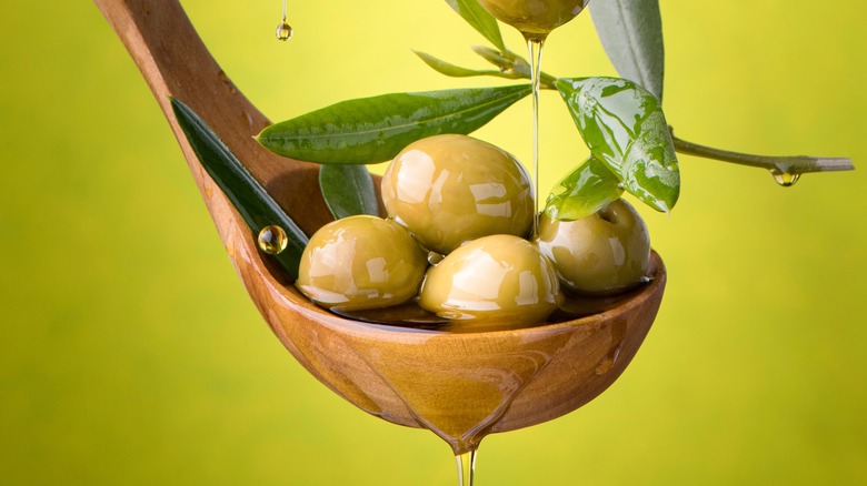 Olives on yellow background