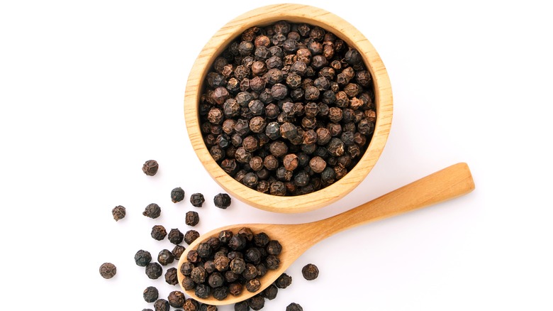 Whole black peppercorns