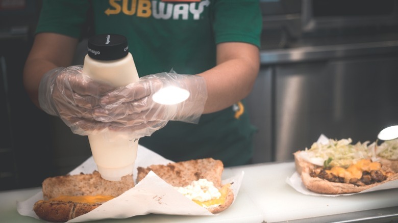 Subway employee with sub