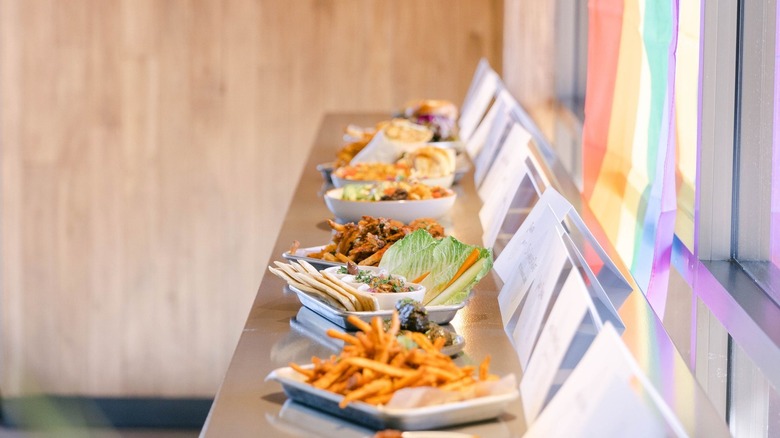 Middle Eastern plates and a rainbow flag