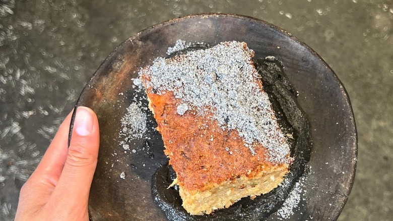 Parsnip cake on black plate