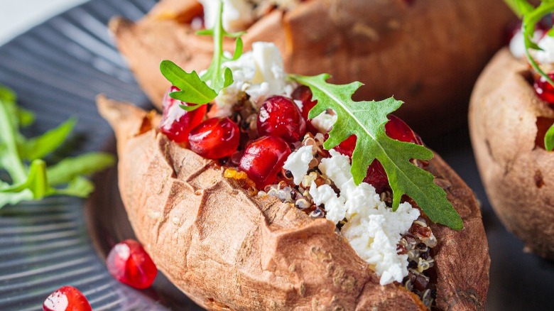 Baked sweet potato with arugula and feta