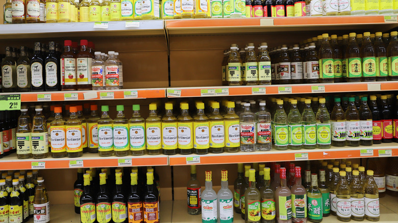 shelves lined with different vinegars