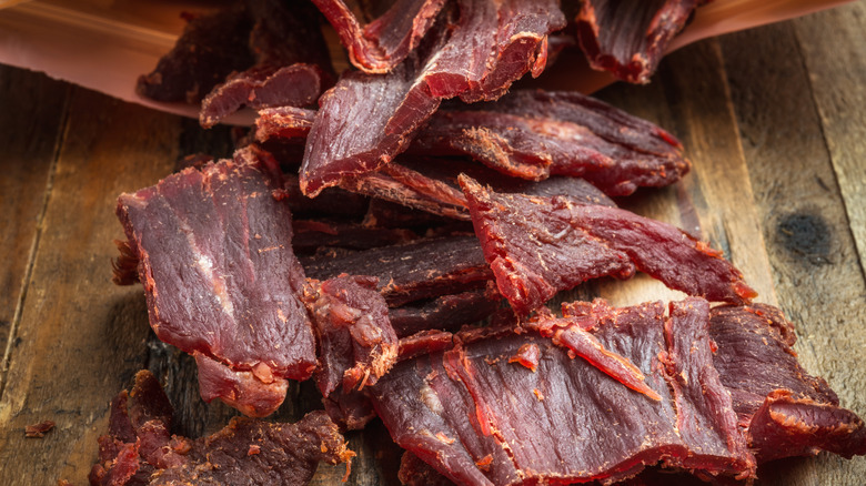 Beef jerky on wooden board