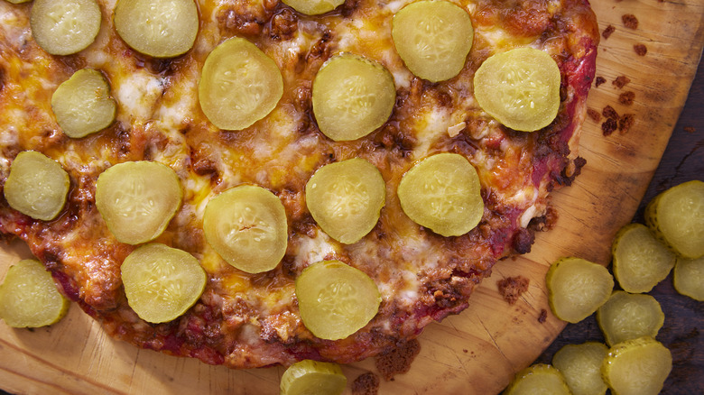 pickle slices on pizza