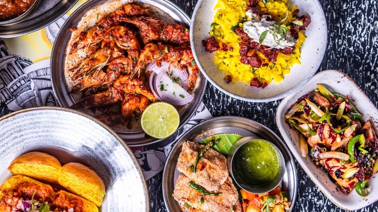 Array of plated Indian dishes