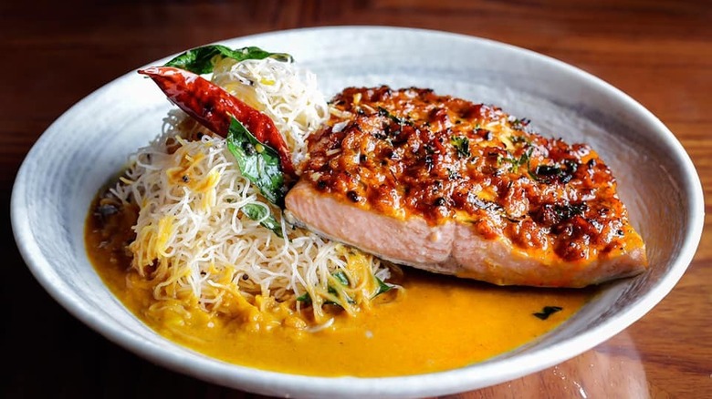 Trout with curried rice noodles