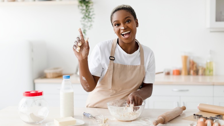 Person in kitchen with apron