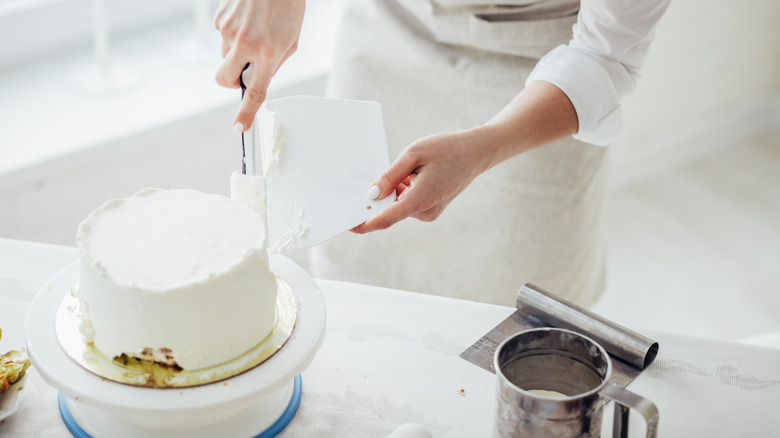 Person using offset spatula