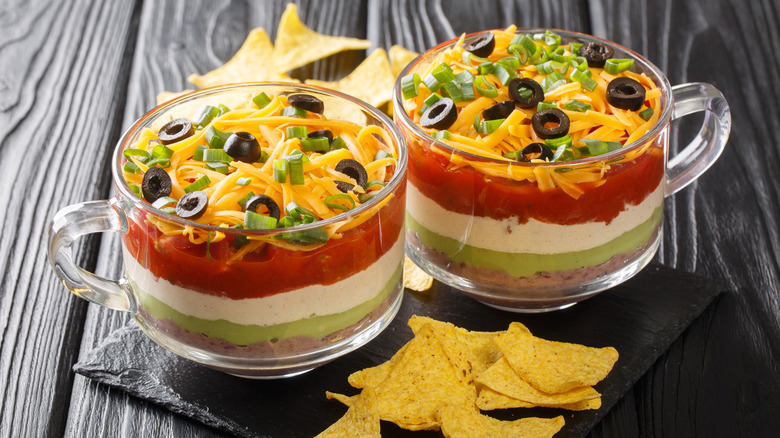 Seven layer dip in glass jars