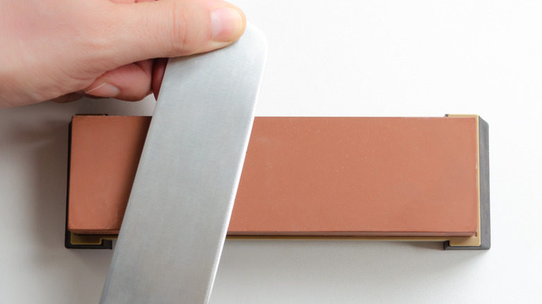 Sharpening Nakiri knife on whetstone