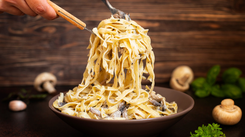 Fettuccine lifted from a bowl