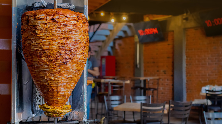 pork on spit in restaurant